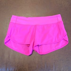Speed up mid rise short 2.5” hot pink